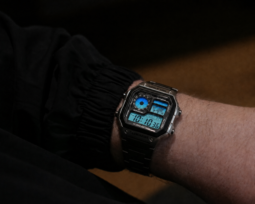 Ice Blue Gradient Casio AE-1200 custom watch worn on the wrist — lifestyle shot showing cool blue gradient display