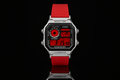 Front view of a custom Casio AE-1200 watch with red display and red resin strap