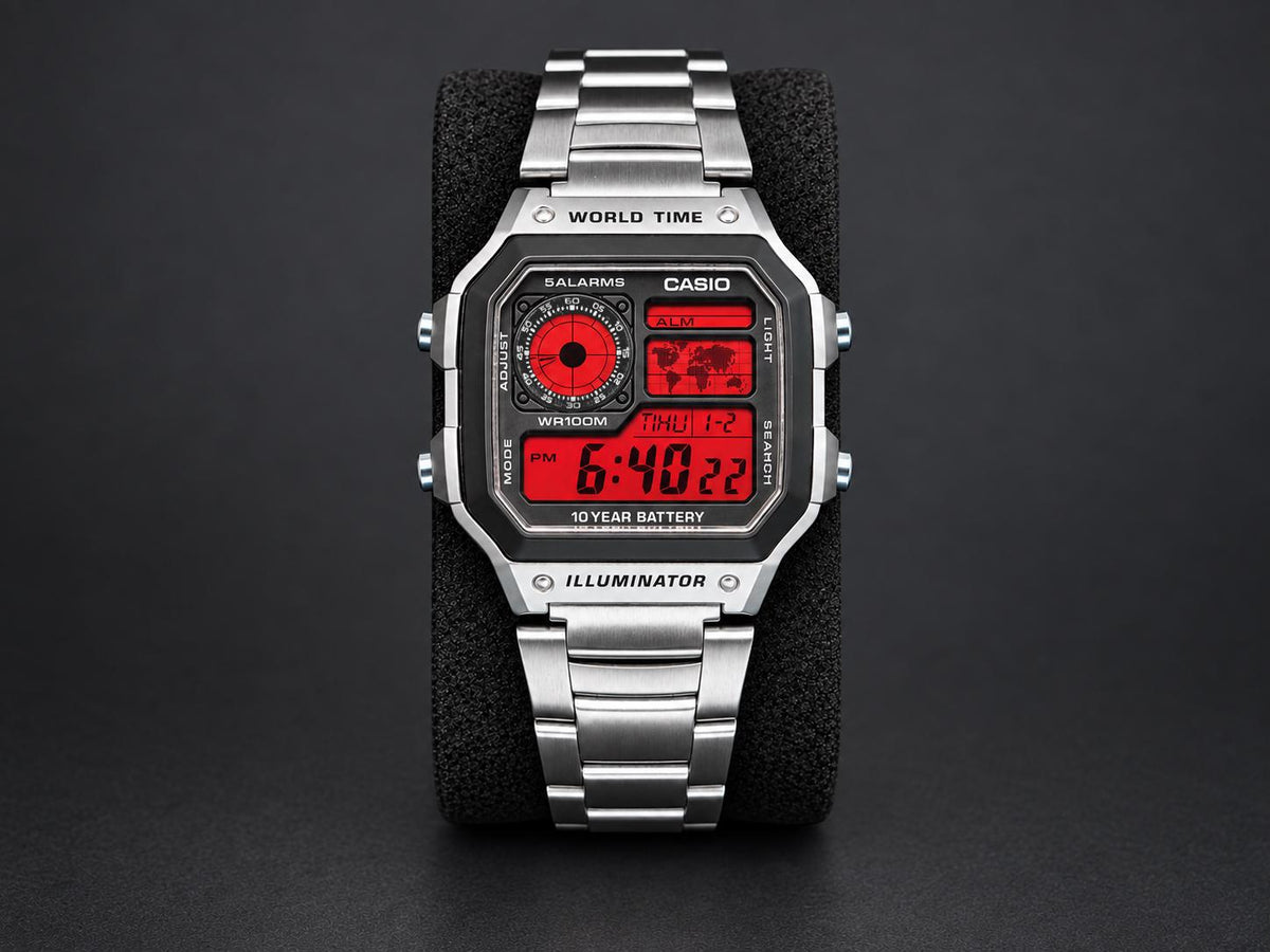 Custom Casio AE-1200 with red display and stainless-steel bracelet, shown from the front